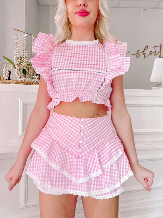 Feeling Fancy Gingham Set by Sassy Shortcake featured in the As Seen on Elle edit with pink gingham crop top and matching skort