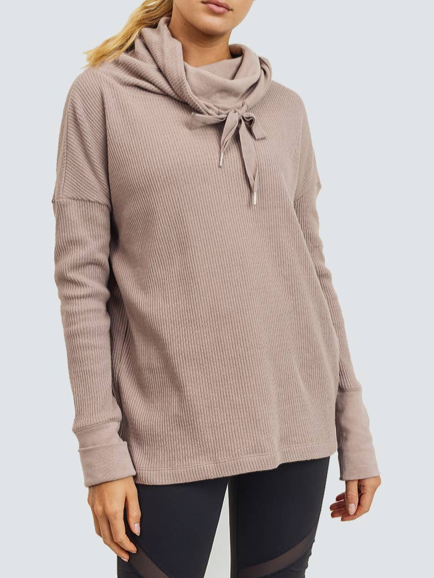 Taupe ribbed knit Lady Luxe pullover with cowl neck and drawstring detail.
