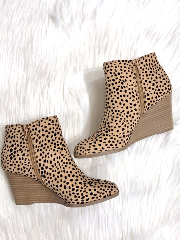 Hear Me Roar Dalmatian print wedge booties; stylish, comfortable wedge heel.
