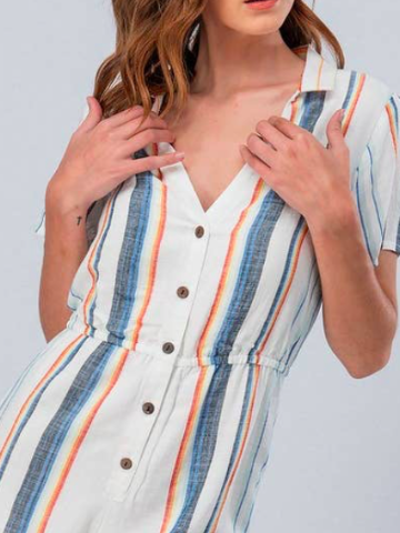 White linen romper with colorful vertical stripes, button closure, and cinched waist.
