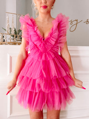 Hot pink Tulle Good to Be True dress: tiered tulle mini dress with ruffled V-neck.
