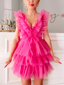 Hot pink Tulle Good to Be True dress: tiered tulle mini dress with ruffled V-neck.
