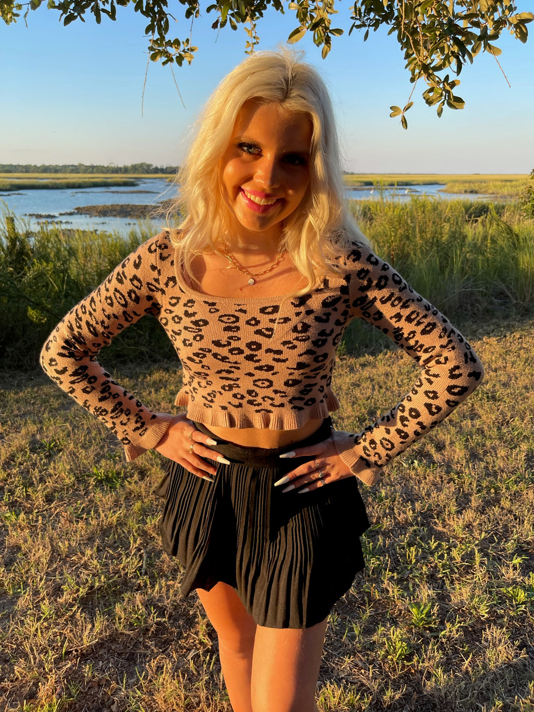 Tan leopard-print long-sleeve crop sweater - animal instincts from sassy shortcake worn outdoors near water.
