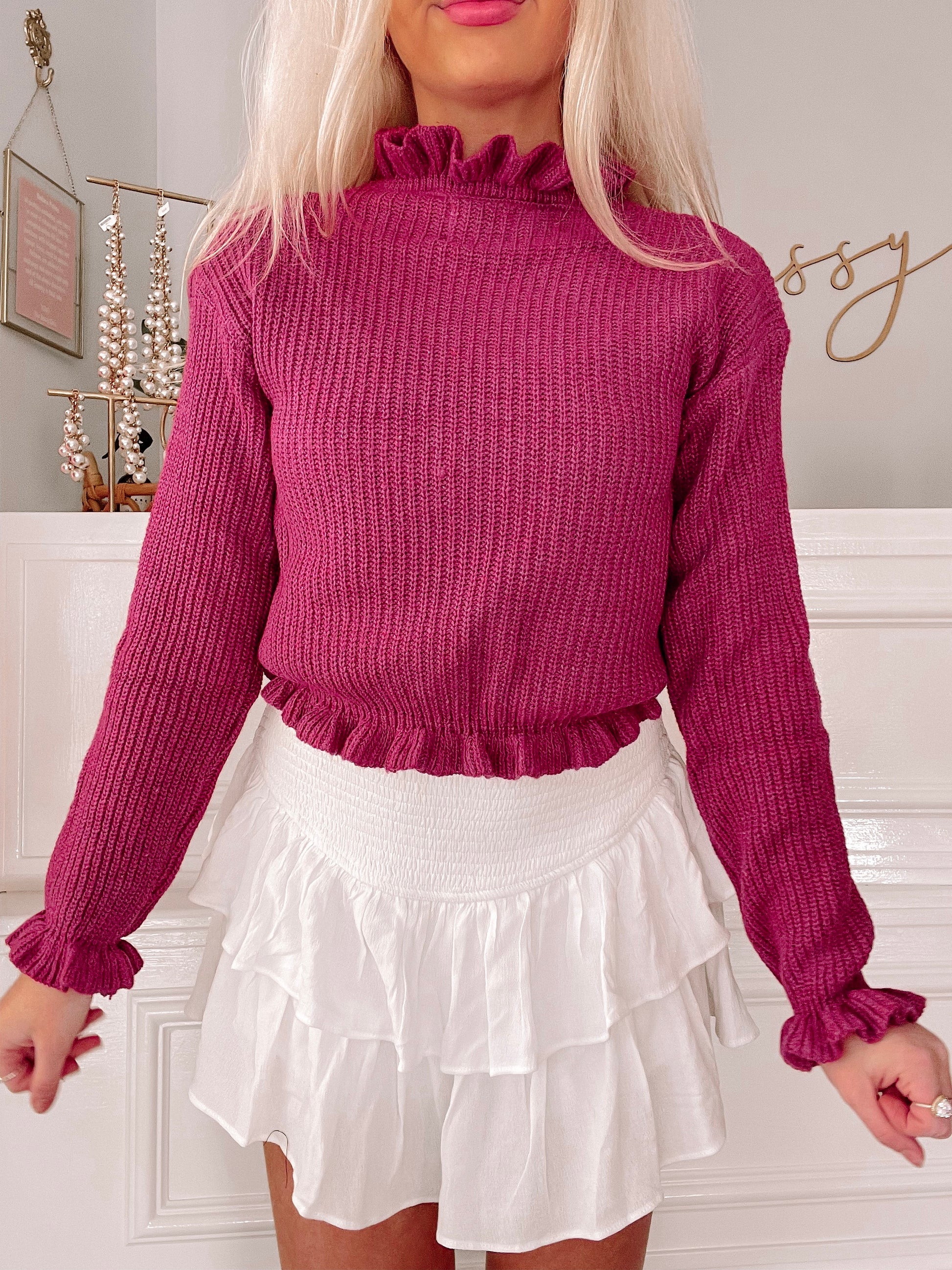 Crimson ribbed Avaline sweater with ruffled neckline and cuffs
