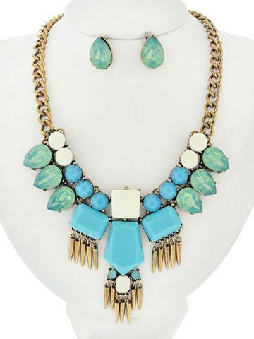 Statement mint and turquoise necklace set with gold chain and matching earrings.
