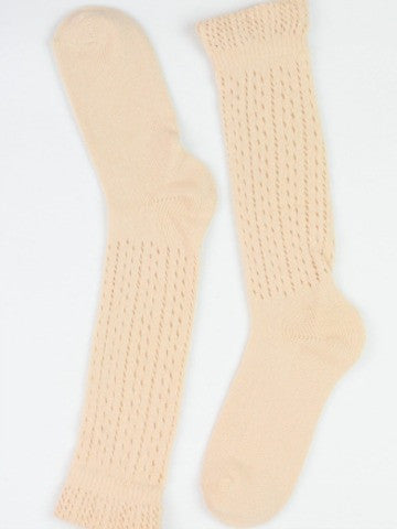 Cream-colored knee-high socks with a delicate open-knit pattern.
