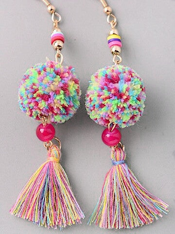 Rainbow pom-pom earrings with colorful tassels and gold accents.
