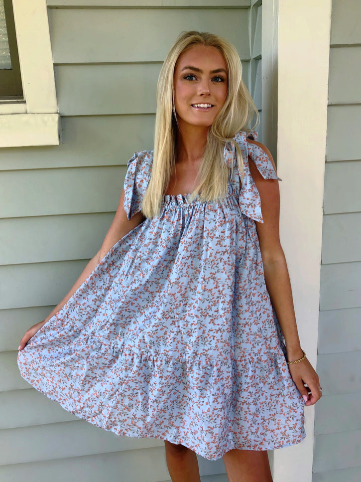 Light blue floral Hey Angel dress with tie straps; tiered mini dress.
