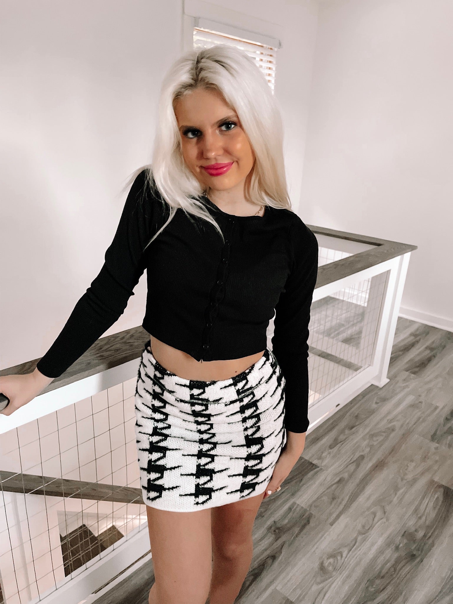 Her Majesty houndstooth mini skirt, black and white, stylish and chic.
