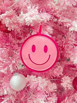 Pink felt Sassy Smiley Christmas ornament with hot pink trim
