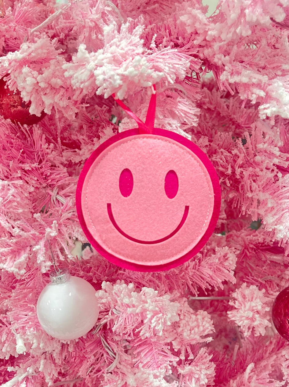 Pink felt Sassy Smiley Christmas ornament with hot pink trim
