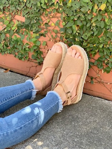 Beige Live a Little platform sandals with ankle buckle and perforated detail.
