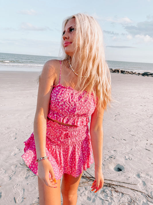Pink floral ruffle top and shorts set, perfect for summer.

