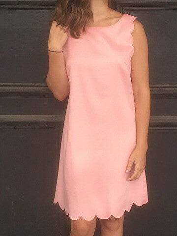 Pink scallop-hemmed sleeveless dress
