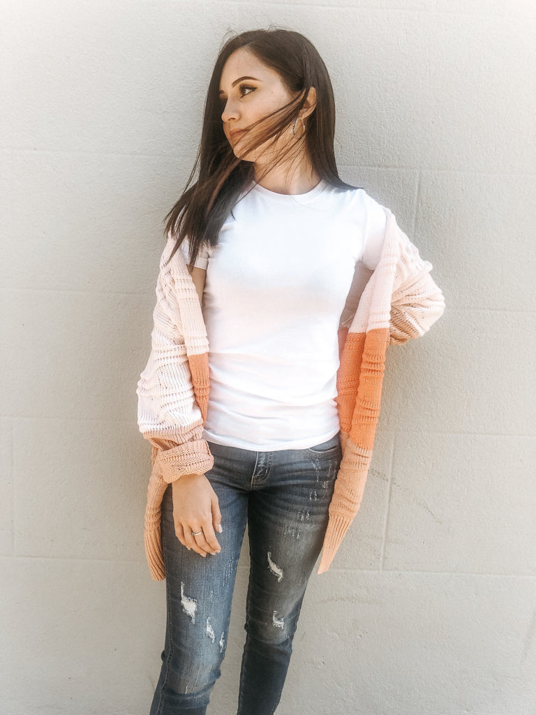 Falling Fast Cardigan: Peach, pink, and orange color-block knit cardigan.
