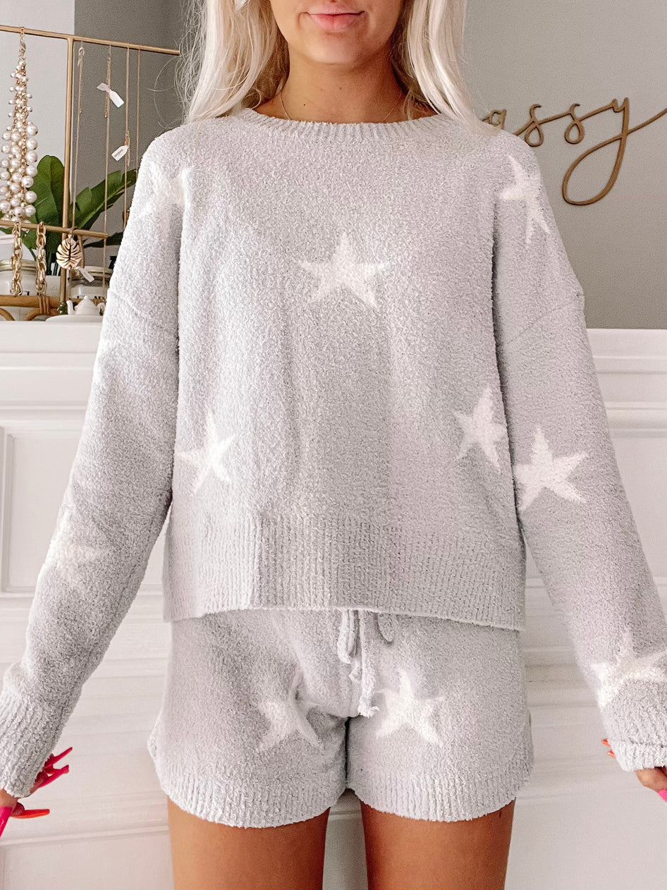 Cozy gray star print sweater and shorts lounge set for ultimate comfort.
