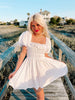 Lydia Smocked White Mini Dress | Sassy Shortcake | sassyshortcake.com