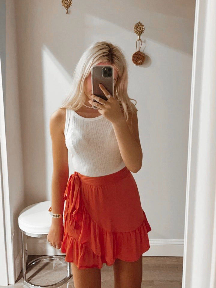 Melon Tate ruffle wrap mini skirt
