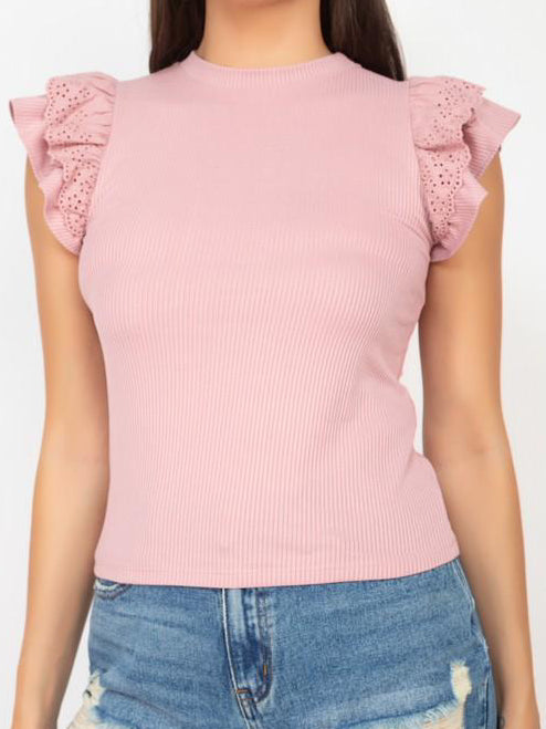 Pink ribbed knit top with eyelet ruffle sleeves.

