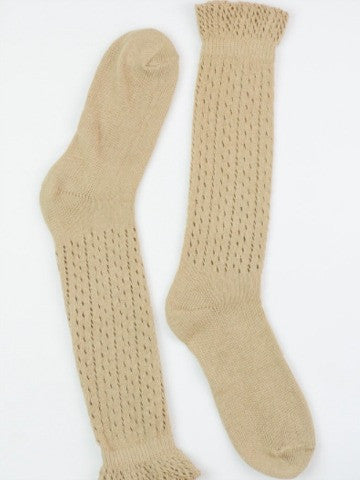 Beige knee-high socks with delicate eyelet detailing and ruffled cuffs.
