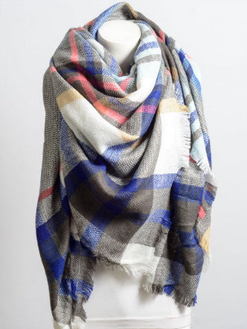 Climate Changer oversized plaid scarf in grey, white, and blue; cozy and warm for fall and winter.
